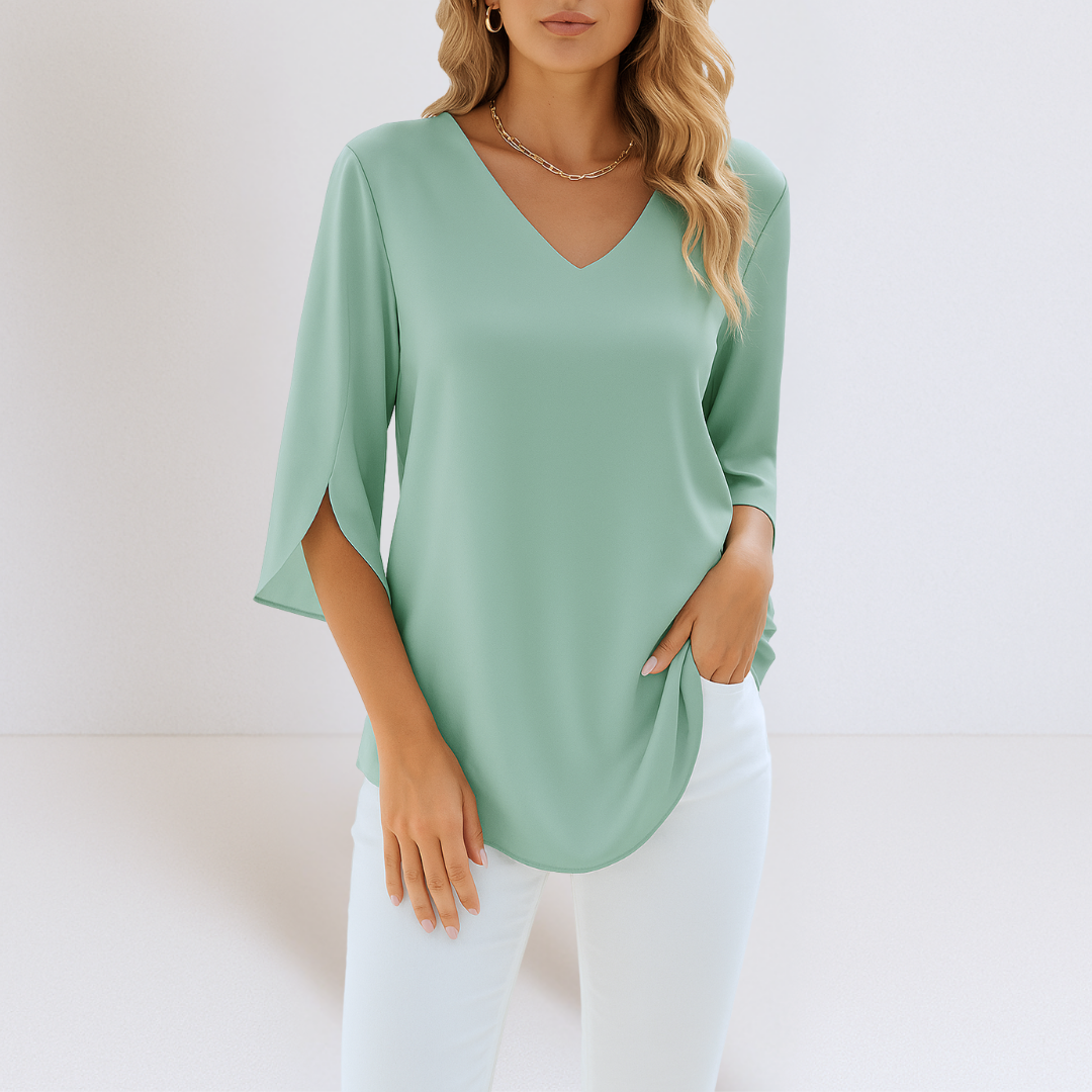Linnea Malmö™ - Elegant blus med V-ringning och slitsade ärmar